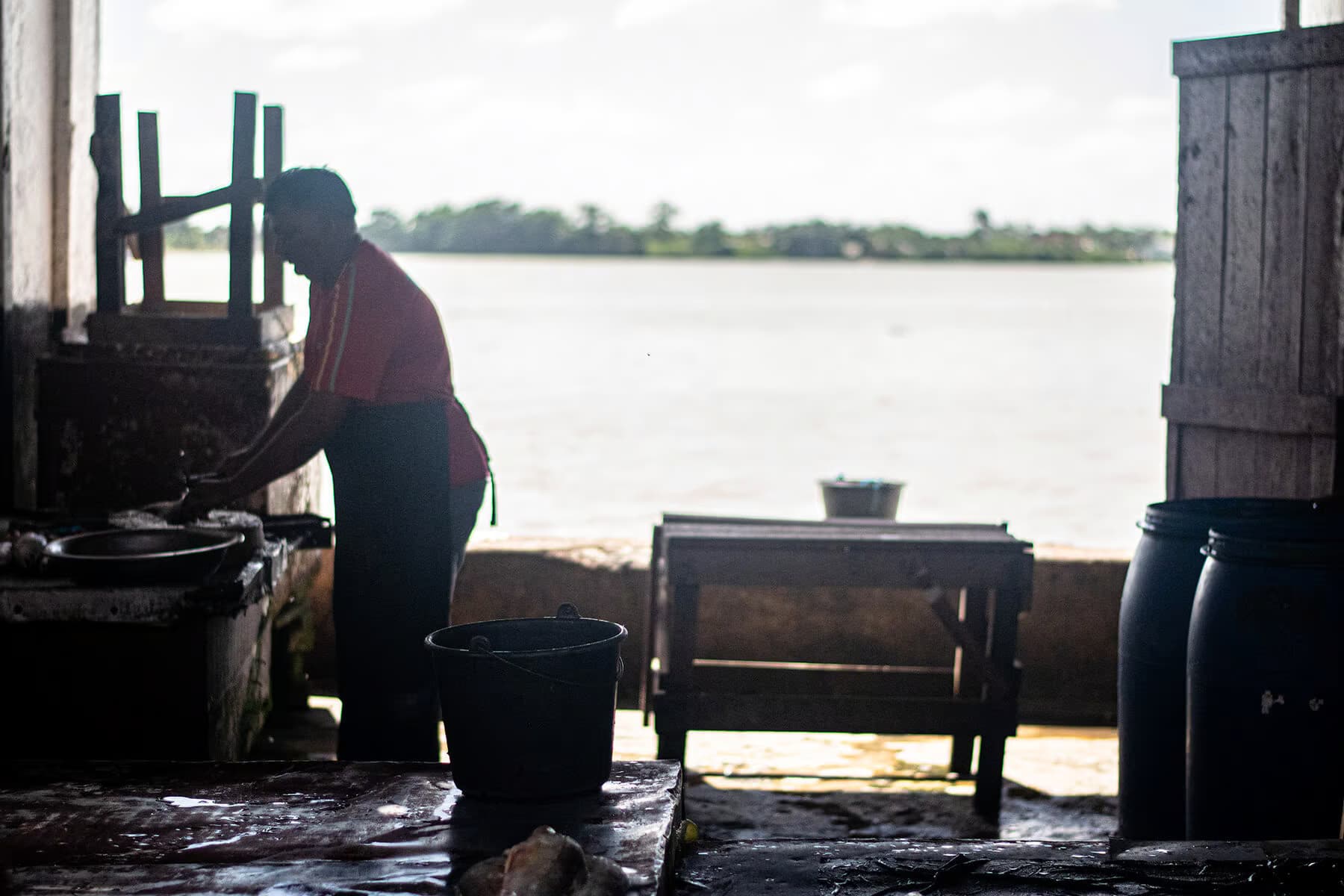 photo of a fisherman on the coast of Paramaribo